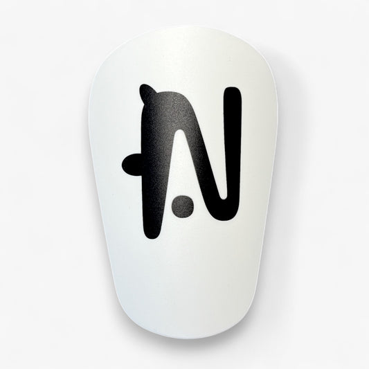 White NTMG Classic Shin Guard with black logo on a white background